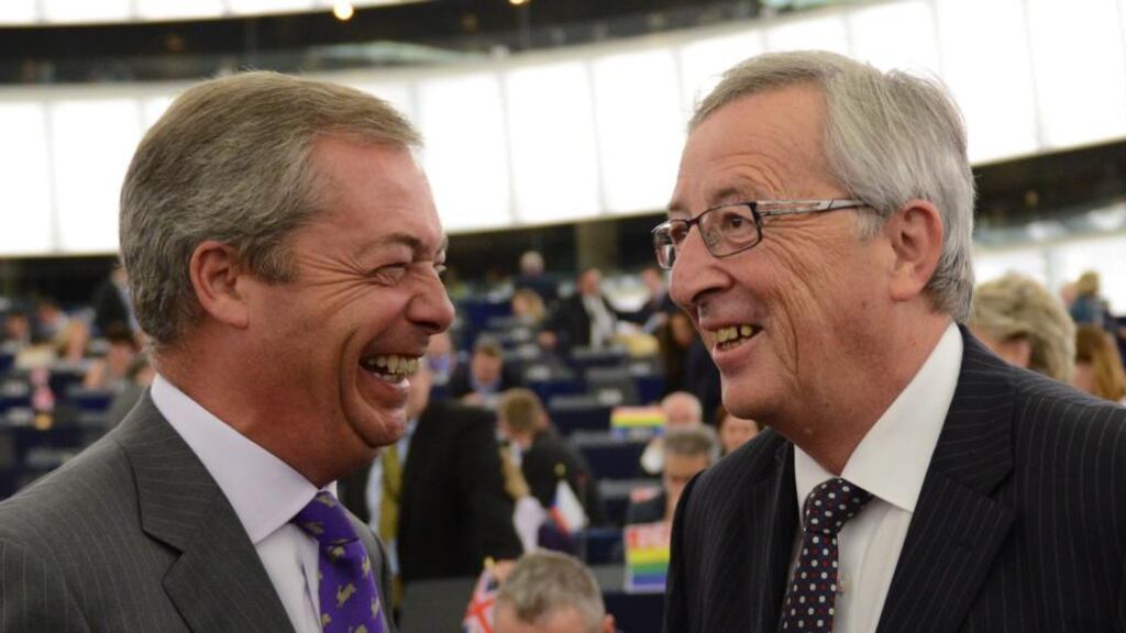 Nigel Farage (left), British Member of the European parliament and leader of the UK Independence Party (UKIP), greets Jean-Claude Juncker, candidate for President of the Commission, before his statement during the plenary session in the European Parliament in Strasbourg, France. Photograph: Patrick Seeger/EPA