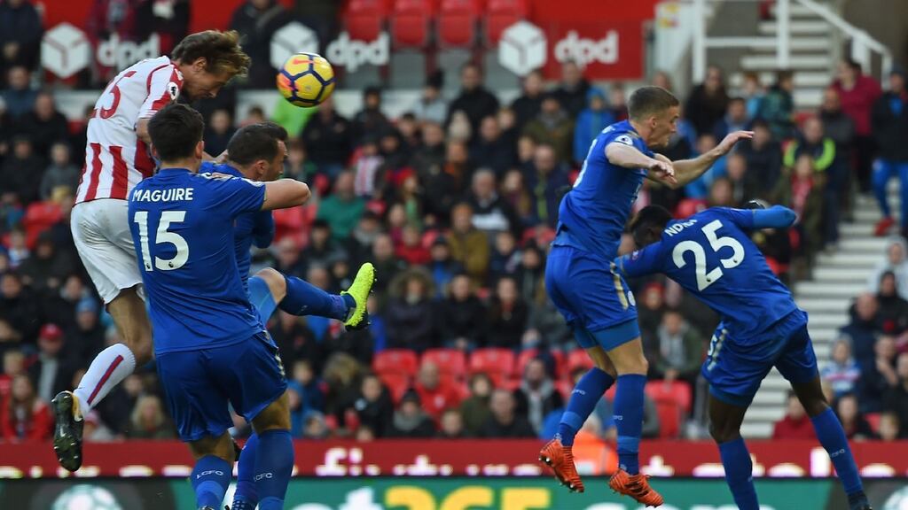 Stoke City sriker Peter Crouch climbs highest to head home his team’s second goal. Photograph: Getty Images
