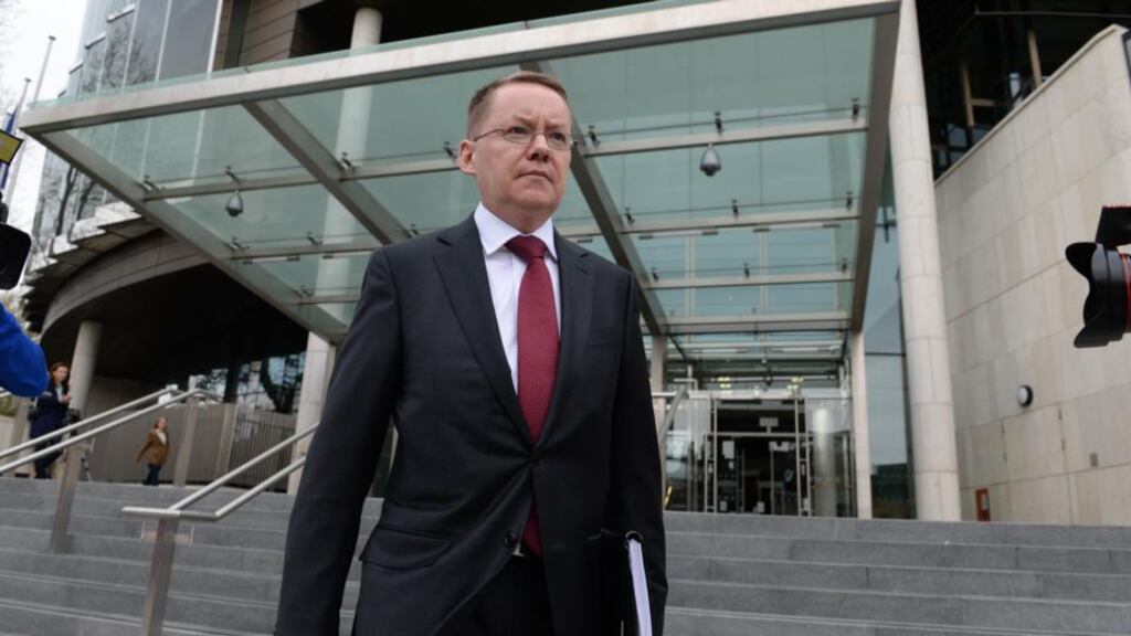 Solicitor Robert Heron leaving after a sentencing hearing of two former Anglo Irish Bank directors  at  Dublin Circuit Criminal Court today. Photograph: Dara Mac Dónaill/The Irish Times