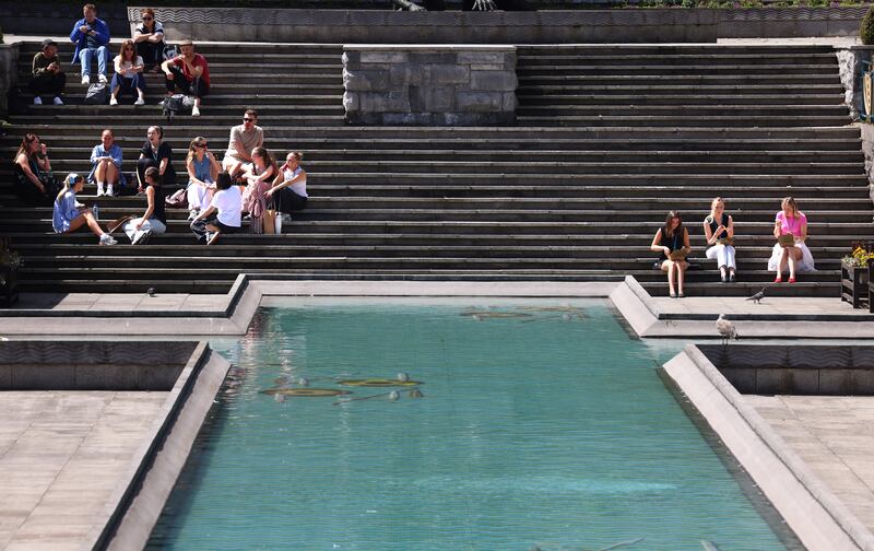 Enjoying the good weather in Garden of Remembrance, Dublin on Thursday. Photograph: Dara Mac Dónaill