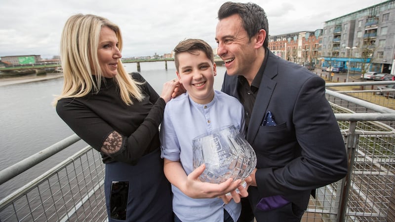 Luke Culhane, who was named Limerick Person of the Year, with his parents Claire and Dermot. Photograph: Seán Curtin/True Media.