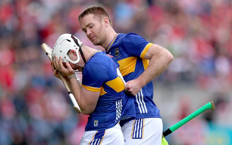 Noel McGrath consoles Darragh McCarthy after he was red carded at the start of the Tipperary v Cork game at Páirc Uí Chaoimh a fortnight ago. Photograph: James Crombie/Inpho