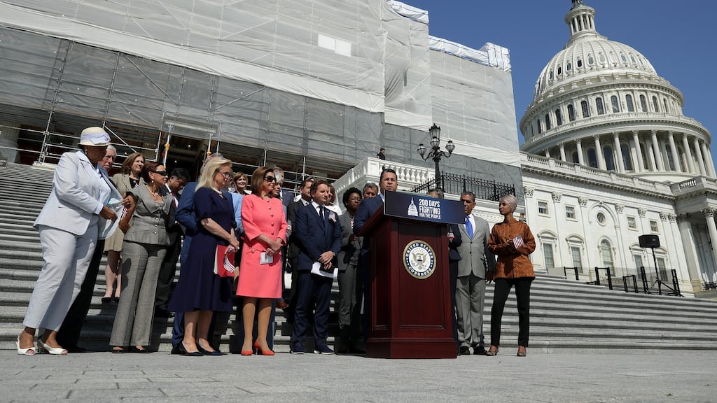 Speaker of the House Nancy Pelosi with fellow House Democrats on the steps outside the US Capitol. She is derided by the far left for her pragmatism, despite being a long-time target for Republicans. Photograph: Getty