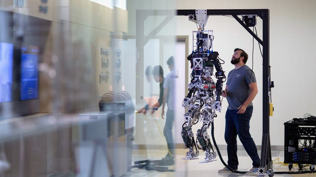 Researchers test a robot for a US competition with a $2 million prize.  PHOTOGRAPH: CHIP SOMODEVILLA/GETTY IMAGES