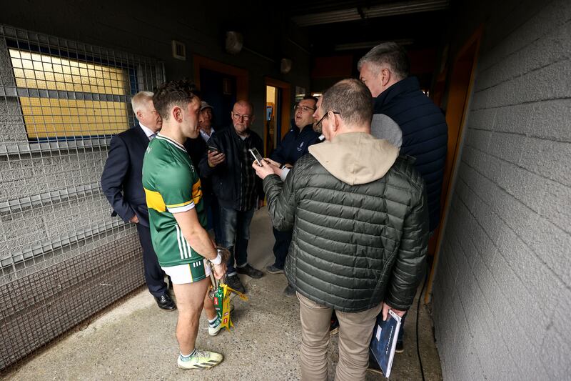 Kerry's Paudie Clifford holds the cup as he speaks to journalists after the game - press were asked to leave the ground less than an hour after the game. Photograph: Ben Brady/Inpho
