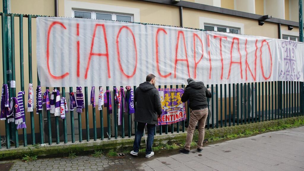 Fiorentina fans put up scarves, flowers and banners in memory of their captain Davide Astori. Photograph: PA