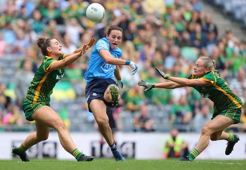 Dublin's Tyrrell scoring a point despite the efforts of Maire O’Shaughnessy and Megan Thynne of Meath in the women's 2021 All-Ireland final in Croke Park. Photograph: Bryan Keane/Inpho