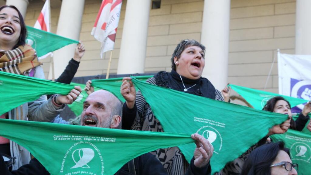A green handkerchief is emblem of the fight for the legalization of abortion in Argentina, seen here at a demonstration for the separation of the Church and the state, in Buenos Aires on July 24th 2018. Photograph: Maria Paulina Rodriguez/ EPA