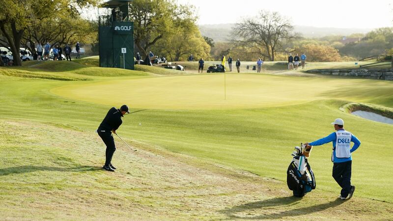 Rory McIlroy plays his shot on the fifth green during his match against Ian Poulter during the first round of the WGC-Dell Technologies Match Play at Austin Country Club in Texas. Photograph: Darren Carroll/Getty Images