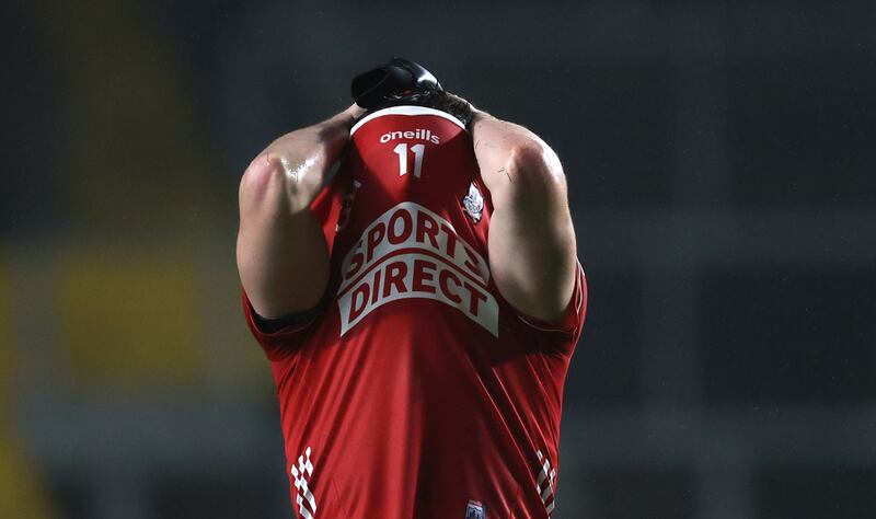 Cork's Eoghan McSweeney dejected after the defeat to Kerry. Photograph: Bryan Keane/Inpho
