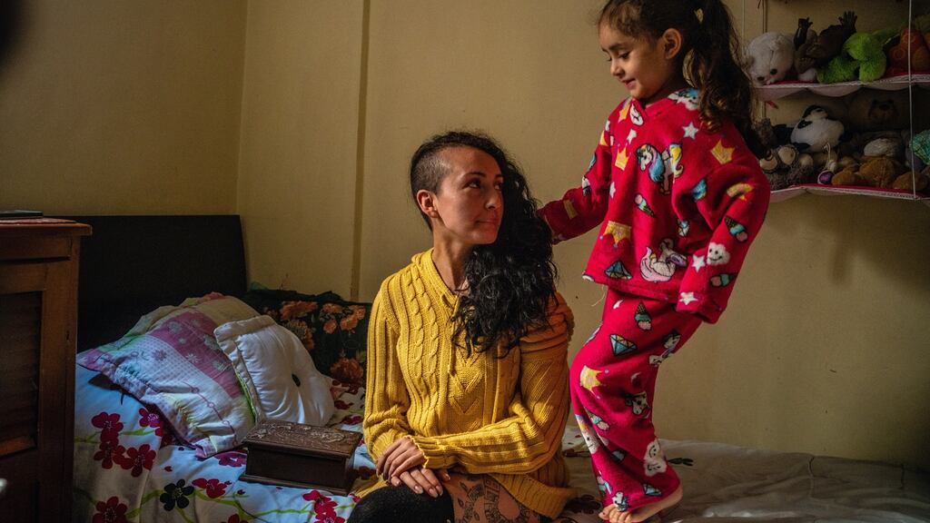 Lina Prieto and her daughter, Luna, at their home in Bogotá, Colombia. Photograph: Federico Rios/New York Times