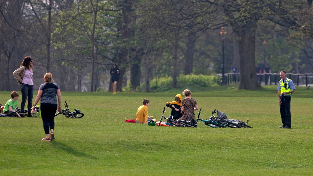 Gardaí in the Phoenix Park ask people to go home at the weekend: According to the survey, nine out of 10 people have a clear understanding of social distancing. Photograph: Colin Keegan, Collins Dublin