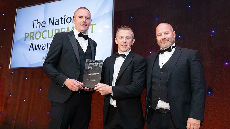 Paul Farrelly, Awards Judge, presents the Best Education Procurement Project of the Year award to Howard Maguire & Liam Mockler, Office of Government Procurement.