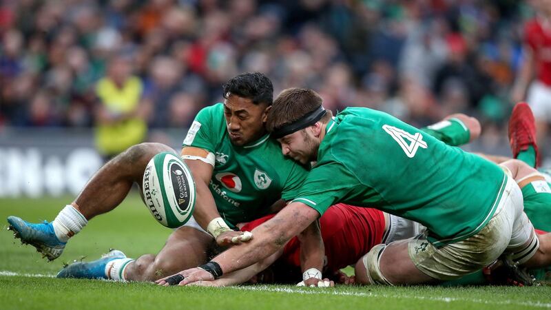 Bundee Aki and Iain Henderson stop Hadleigh Parkes from scoring in Dublin. Photograph: Bryan Keane/Inpho