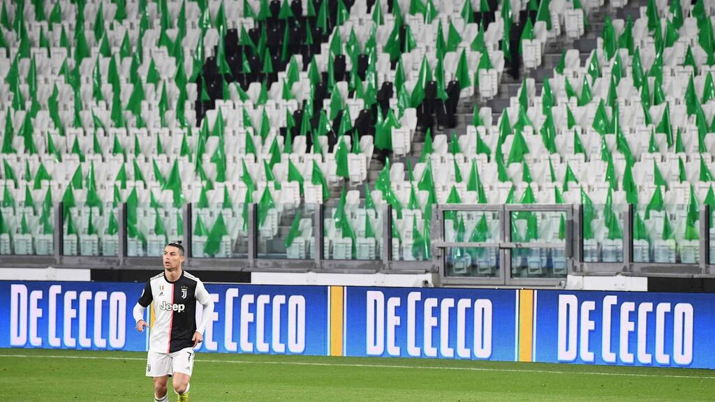 Cristiano Ronaldo playing for Juventus in an empty stadium during the recent Serie A game against Inter Milan before the league was suspended due to the coronavirus outbreak. Photograph: Vincenzo Pinto/AFP via Getty Images