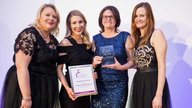 Sarah McCourt, Katie Cosgrove and Teresa McCreery from the Community Midwives Team, National Maternity Hospital, Holles Street, Dublin, receiving their award  for innovation in practice from Madeleine Murphy, the former editor of the ‘British Journal of Midwifery’