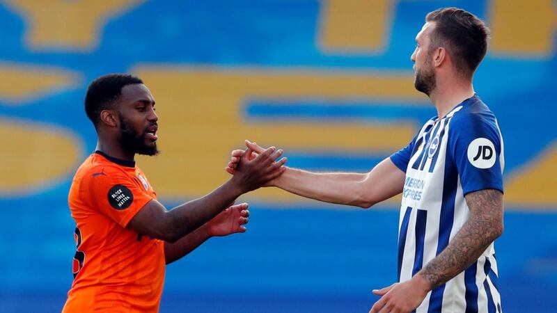 Brighton’s Shane Duffy shakes hands with Danny Rose of Newcastle United after a recent Premier League game. Photograph: Andrew Couldridge/Pool via Getty Images