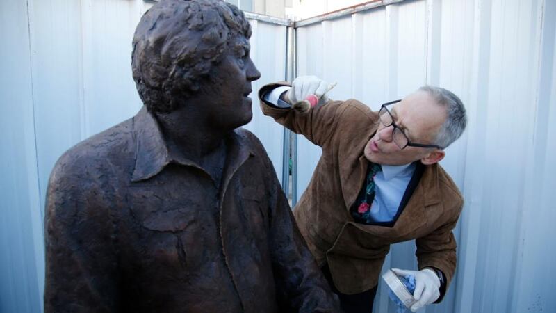 Sculptor Mark Richards prepares for the unveiling of his Big Tom McBride statue in Castleblaney, Co Monaghan. Photograph: Nick Bradshaw