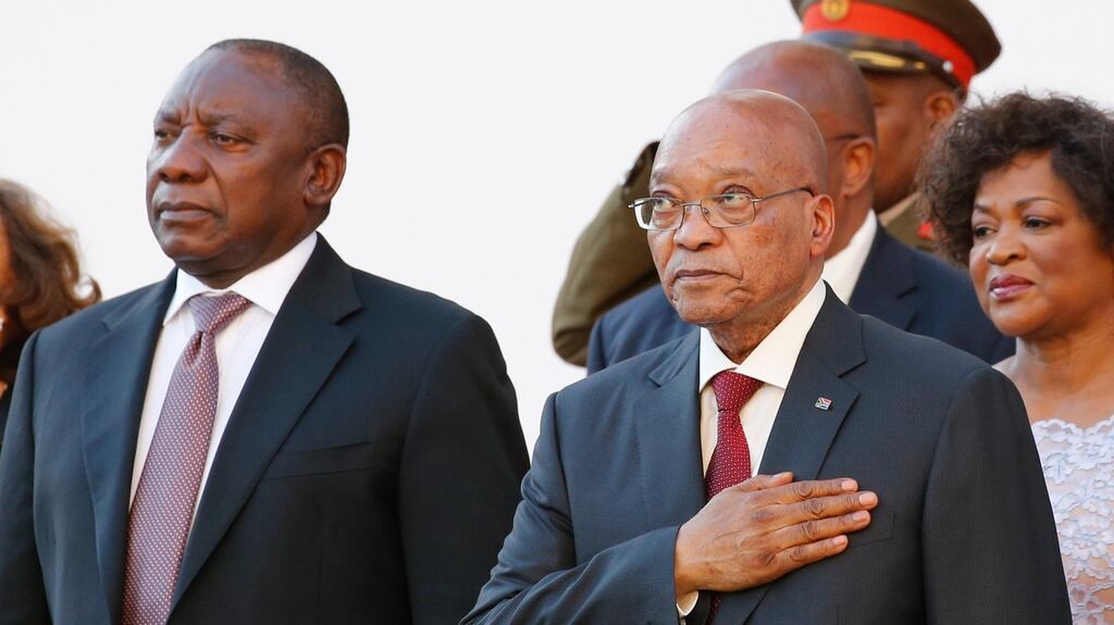 South Africa’s deputy president Cyril Ramaphosa and president Jacob Zuma stand during the playing of the national anthem in parliament in Cape Town. Photograph: Mike Hutchings/Reutes