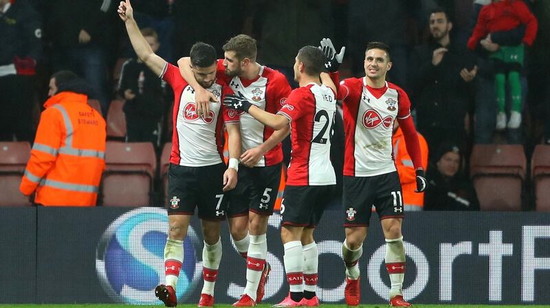 Shane Long of Southampton celebrates after scoring his side’s first goal. Photograph: Warren Little/Getty Images