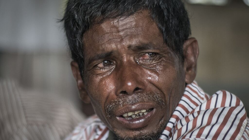 A Rohingya Muslim refugee mourns beside the body of his child near Inani beach in Cox’s Bazar district. File photograph: Fred Dufour/AFP/Getty Images