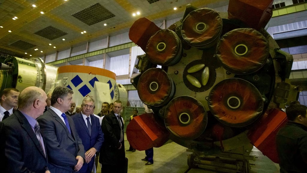 Ukraine’s President Petro Poroshenko visiting the Yuzhmash factory in Dnipro in October 2014. The factory has been linked with the supply of powerful missile engines to North Korea. Photograph: Mykhailo Markiv/Ukrainian Presidential Press Service