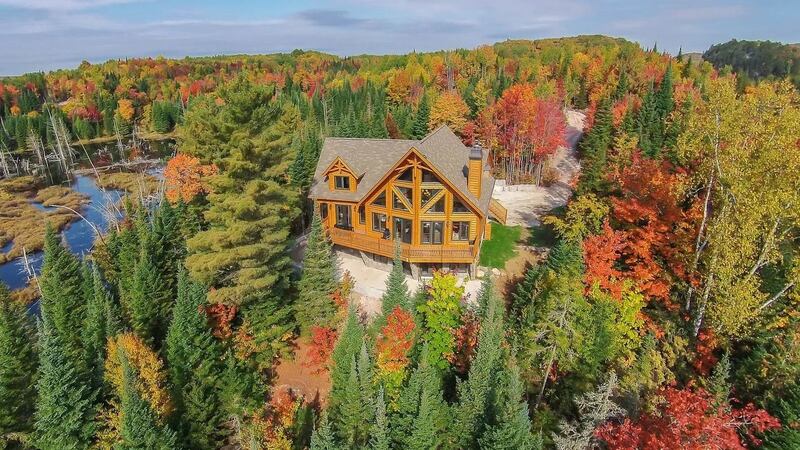 Quebec, Canada: Set in the idyllic spot of Amherst in the Laurentides, this five-bedroom wooden lodge is the ultimate getaway.