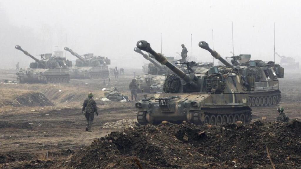 South Korean Marine K-55 self-propelled howitzers on positions during an exercise against possible attacks by North Korea near the border village of Panmunjom in Paju. Photograph: Ahn Young-joon/AP