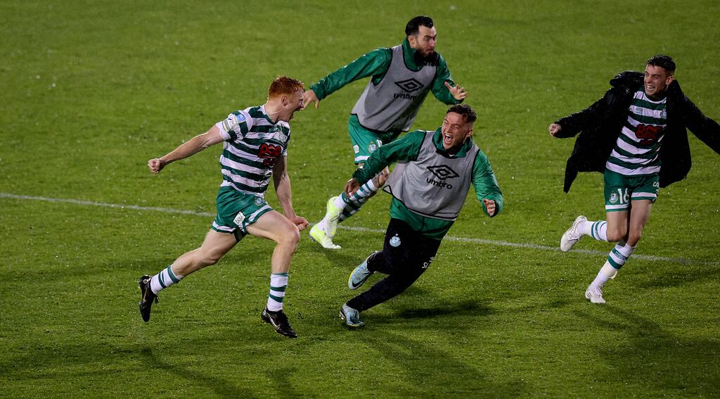 Rory Gaffney celebrates scoring his stoppage-time winner with Shamrock Rovers' substitutes during the SSE Airtricity League Premier Division game against Shelbourne at Tallaght Stadium. Photograph: Ryan Byrne/Inpho