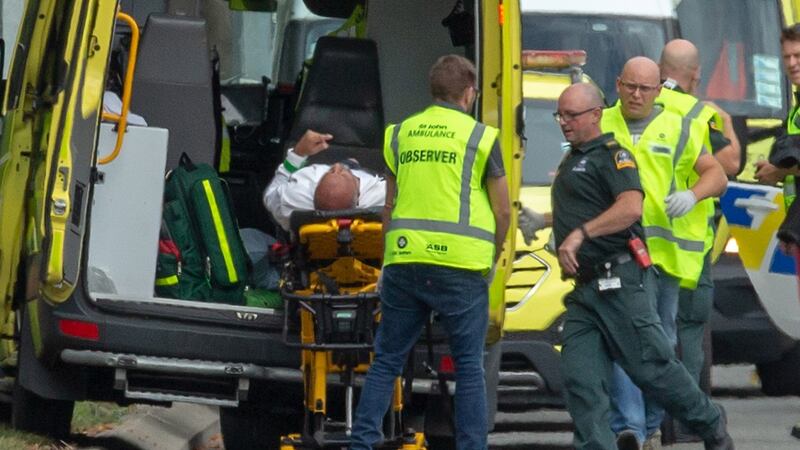 An injured person is loaded in an ambulance following a shooting at the Masjid Al Noor mosque in Christchurch, New Zealand. Photograph: EPA