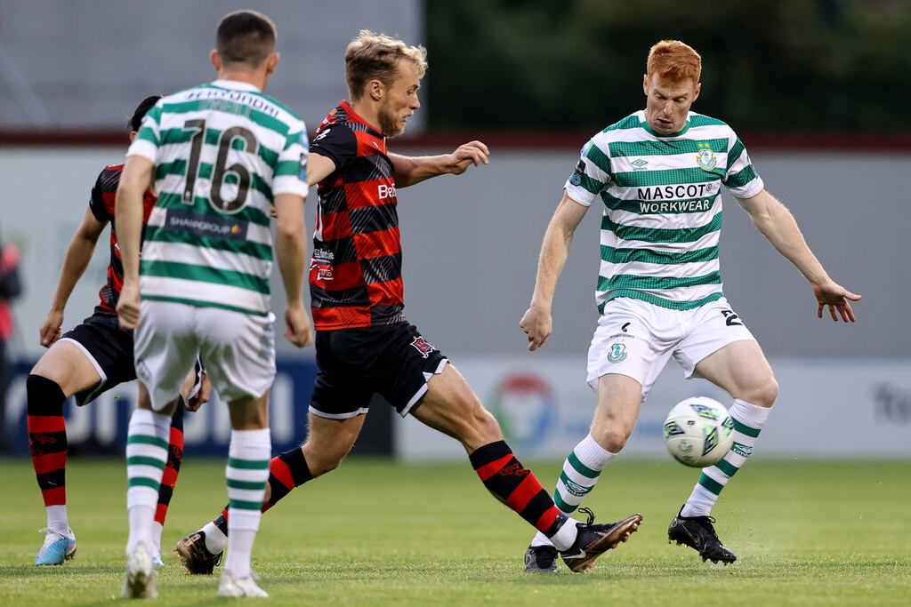 Dundalk's Greg Sloggett with Rory Gaffney of Shamrock Rovers. Photograph: Ben Brady/Inpho