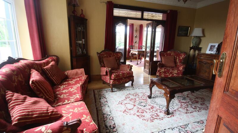 The sitting room - pictured recently with changed decor from 50 years ago - of the house in Athlone where IRA was allegedly formed in December 1969. Photograph: Supplied by Morgan Fagg