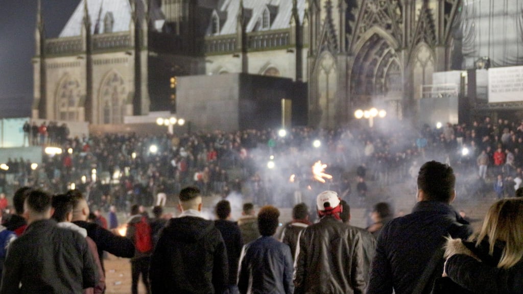 Crowds outside Cologne’s main train station on New Year’s Eve. Photograph: Markus Boehme/EPA
