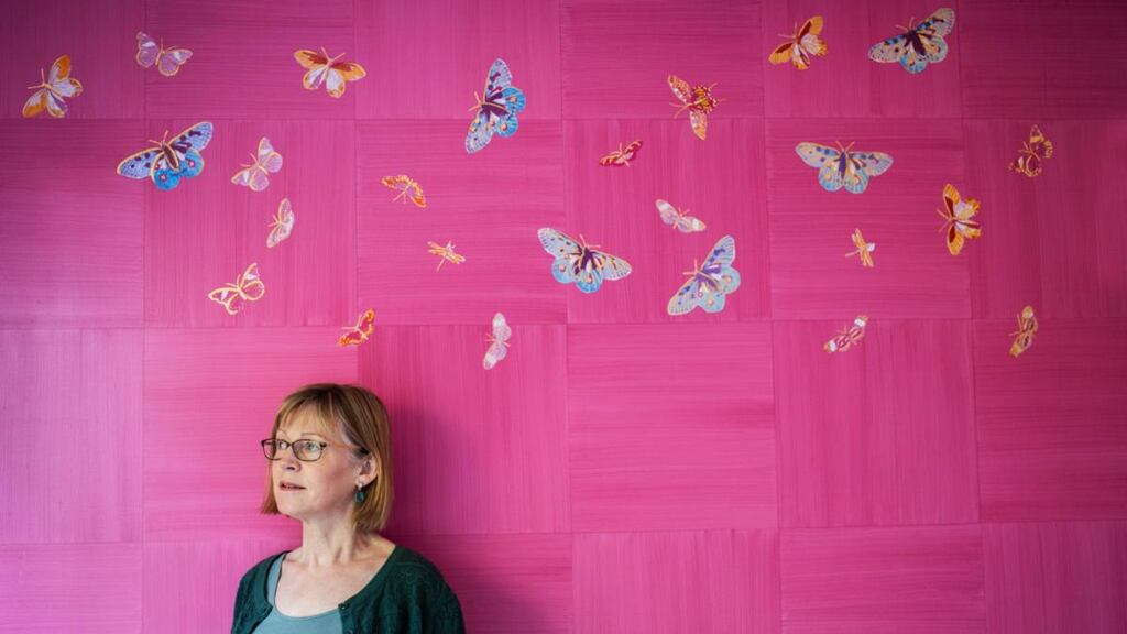 Paintbox home: Geraldine O’Riordan in front of a wall painted for her grandchild. Photograph: Clare Keogh