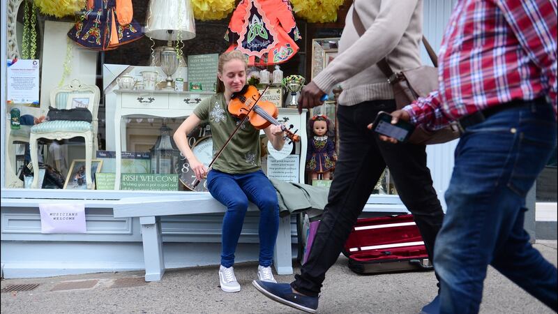 Seoda Matthews from Drogheda playing on the street during Fleadh Cheoil Na hEireann in Drogheda in 2018. The Fleadh returns to the Co Louth town this year. Photograph: Bryan O’Brien/The Irish Times