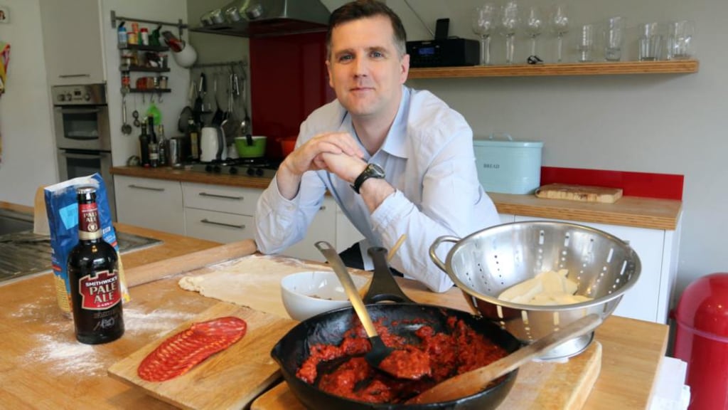 Liam Reid, who makes some of Ireland’s best pizza, according to his wife, restaurant critic Catherine Cleary, getting to grips with his signature pizza in the family kitchen. Photograph: Nick Bradshaw