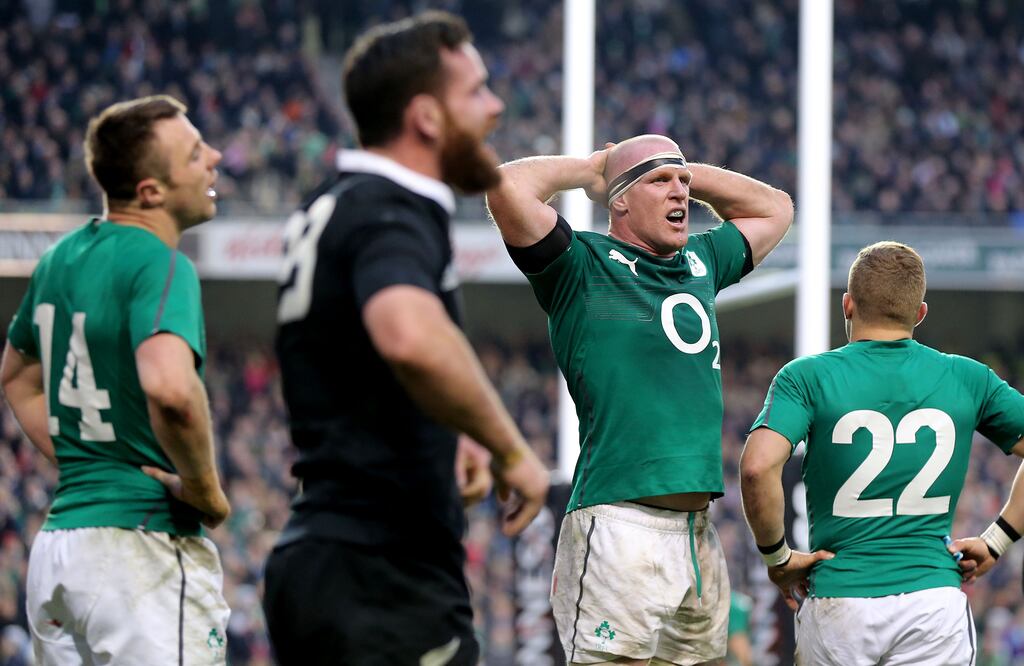 Ireland's Tommy Bowe and Paul O'Connell dejected after Ryan Crotty scored a late try for New Zealand in 2013. Photograph: James Crombie/Inpho