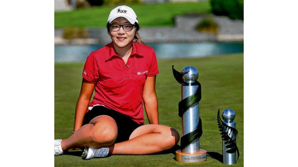 Lydia Ko of New Zealand with the NZ Women's Open trophy after winning the New Zealand Open at Clearwater Golf Course yesterday in Christchurch, New Zealand. photograph: joseph johnson/getty images