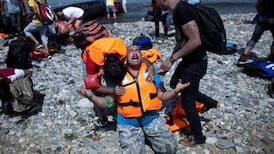 Germany expects to take at least 800,000 migrants this year