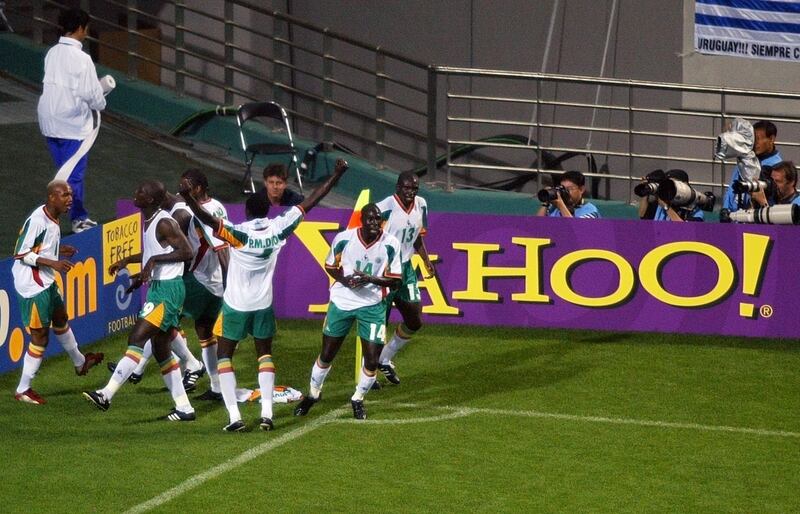 Senegalese players celebrate after Pape Bouba Diop scores what turned out to be the only goal of the game against France at the 2022 World Cup. Photograph: Jacques Demarthon/AFP via Getty Images