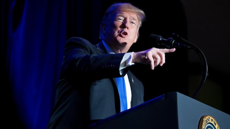 President Donald Trump will sign a bill to avert a second government shutdown, but will also declare a national emergency to secure border wall funding. Photograph: Michael Reynolds/EPA