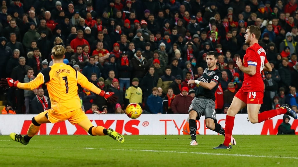 Southampton’s Shane Long scores in injury time in the EFL Cup second leg against Liverpool at Anfield. Photograph: Jason Cairnduff/Action Images via Reuters/Livepic