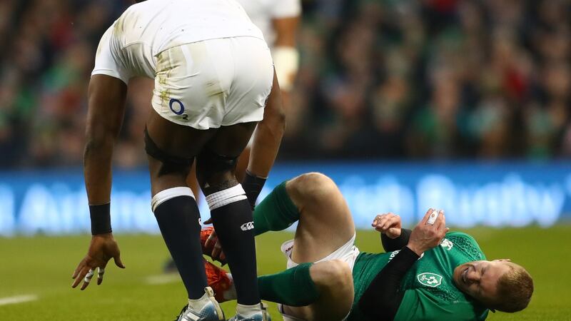 Keith Earls following his collision with England’s Maro. Photograph: James Crombie/Inpho