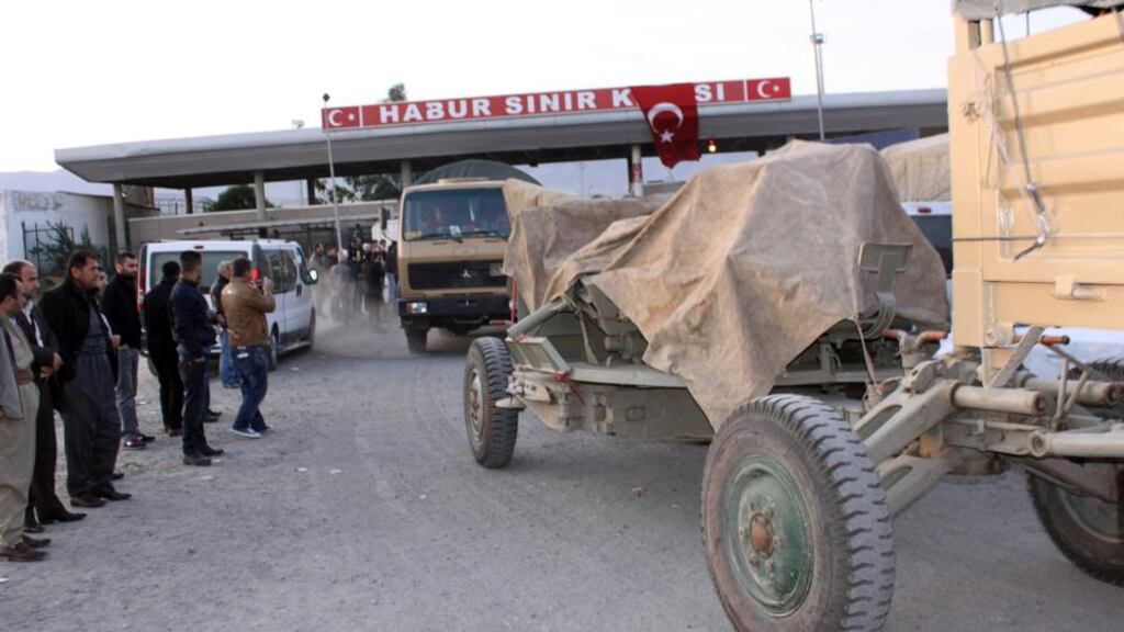 A convoy of Iraqi peshmerga fighters arrive in southeastern Turkey early today ahead of their planned deployment to the Syrian town of Kobani to help fellow Kurds repel an Islamic State advance which has defied US-led air strikes. Photograph: Reuters
