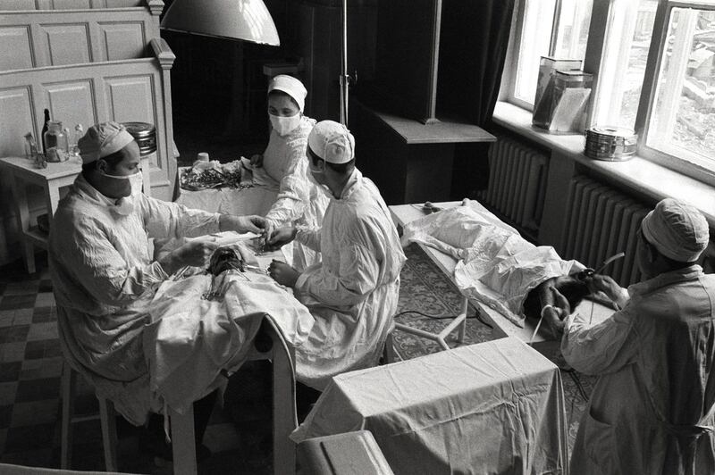 In 1958, Radio Moscow described a new surgical device that apparently made possible the grafting of a head of a puppy on to a fully grown dog. This photo shows the operation in progress. The transplant was led by Soviet surgeon Vladimir Demikhov at the Moscow Medical Institute.