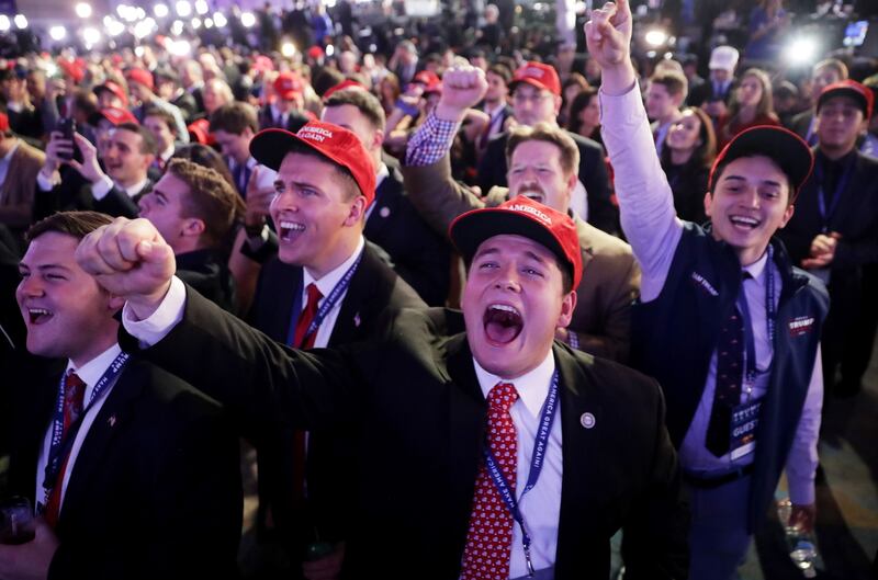Supporters of Republican presidential nominee Donald Trump cheer during the election night event at the New York Hilton Midtown. Photograph: Chip Somodevilla/Getty Images