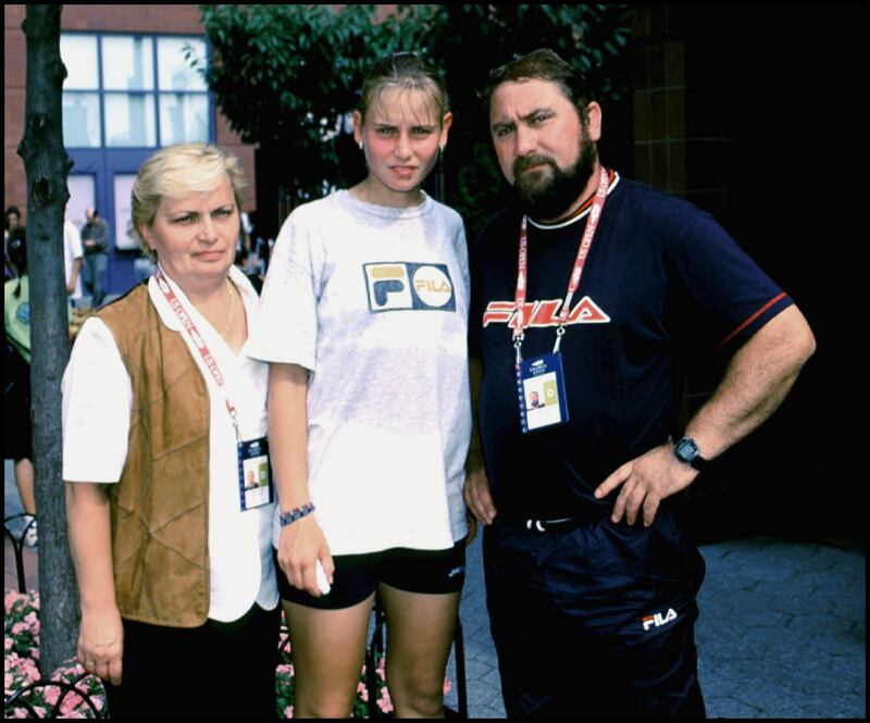 Jelena Dokic, centre, with her father Damir Dokic at the 1999 US Open. Photograph: Art Seitz/Getty