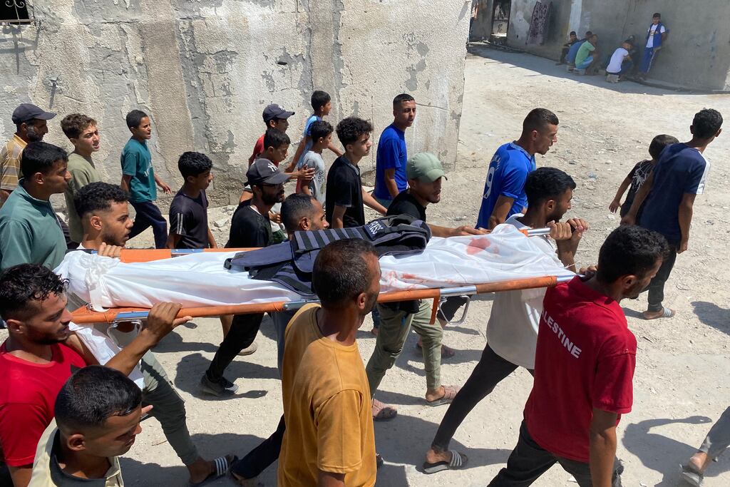 Mourners carry the body of one of five journalists killed in an Israeli strike on Nasser hospital in Khan Yunis in the southern Gaza Strip, during their funeral on Tuesday. Photograph: AFP