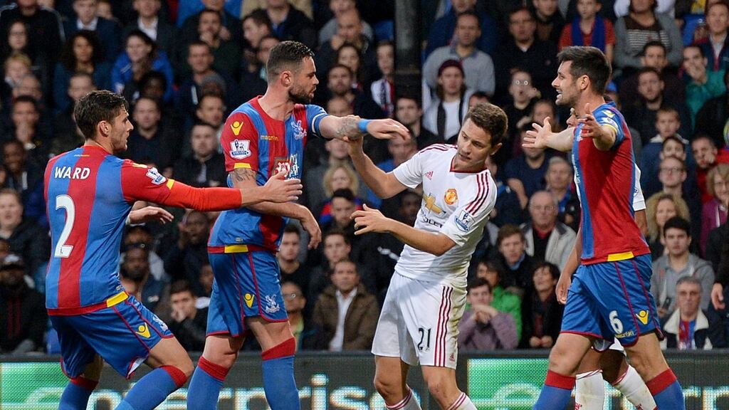 Crystal Palace’s Damien Delaney exchanges words with Manchester United’s Ander Herrera during the Premier League match at Selhurst Park. Photograph:  Anthony Devlin/PA