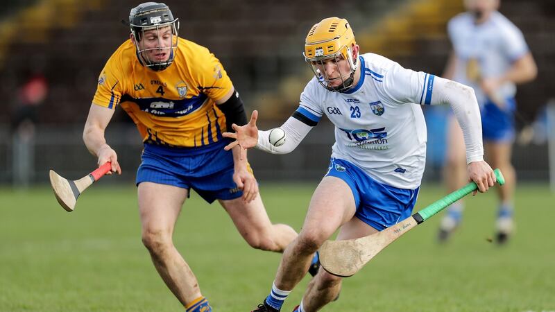 Waterford’s Peter Hogan takes on Clare’s Jack Browne of Clare. Photograph: Laszlo Geczo/INPHO